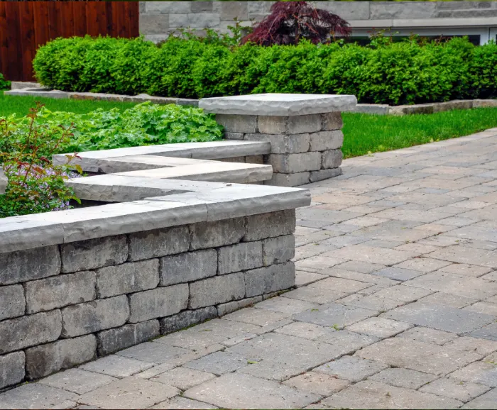 Finished retaining wall with pavers patio